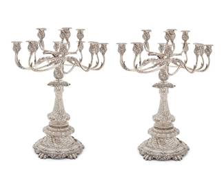 164
The Vanderbilt Candelabra: A Pair of Monumental 15-Light Tiffany & Co. Sterling Silver Candelabra
Circa 1883; Directorship of Edward C. Moore (1873-1891)
Each marked to underside of foot: Tiffany & Co. Makers / Sterling Silver / 925-1000 / M; and numbered: 7353 / 8887
Design attributed to Charles T. Grosjean
Each fifteen-light candelabrum profusely decorated with swirling acanthus leaves, shells, seaweed, and stylized dolphin's masks, on six lion's-paw feet
Each: 31.5" H x 23" Dia.
Total weight: 764 oz. troy approximately
Estimate: $100,000 - $150,000