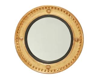 214
A Regency style giltwood convex mirror
20th century
With beaded edge and four lion's head masks
35" Dia. x 3" D
Estimate: $800 - $1,200