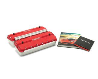 132
"Il Fascino Ferrari: A Monument to Italy's Driving Force"
Allievi, Giuseppe (Pino), "Il Fascino Ferrari: A Monument to Italy's Driving Force," Cologne, Germany: Taschen, 2018
Softcover book in aluminum case
Edition: 1028/1947
Signed to edition page: Piero Ferrari
The red leather-bound folio with silvered page edges, housed in an engine-form aluminum case designed by Marc Newsom, containing hundreds of photographs from the Ferrari archives and private collectors compiled between 1947-2017, chronicling the carmaker's legacy
Case: 6.5" H x 22.75" W x 18.25" D; Book: 17.625" H x 13.5" W x 2.375" D
Together with:
Cancellieri, Gianni and Manuel Taboada, "Ferrari: All Victories 1947-2017," Cologne, Germany: Taschen, 2018
Hardcover book
11" H x 8.75" W x 0.75" D
Raupp, Günther, "The Ferrari Book," Krefeld, Germany: TeNeues, 2013
Hardcover book
14.875" H x 12.375" W x 1.25" D
3 pieces total
Estimate: $5,000 - $7,000