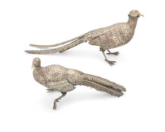 27
A pair of Italian sterling silver figures of pheasants
Late 19th/20th century
Each appears unmarked
Comprising one rooster and one hen
2 pieces
Larger: 13" H x 29" W x 6" D; Smaller: 10.5" H x 18" W x 6.5" D
Total weight: 84.7 oz. troy approximately
Estimate: $1,000 - $1,500