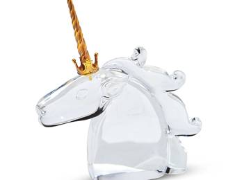 54
A Steuben 18K gold and glass unicorn sculpture
Late 20th century
Etched to underside: Steuben; the horn stamped: 18K S
Model 1004, Designed by James Houston, model introduced 1965, with original fitted box
Figure: 7" H x 6" W x 2" D; Box: 5.5" H x 11.75" W x 7.625" D
Estimate: $800 - $1,200