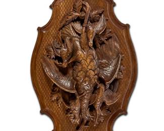85
A Continental carved wood wall plaque
20th century
Depicting game birds in high relief
42" H x 24" W x 7" D
Estimate: $300 - $500