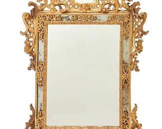 117
A Louis XV-style carved giltwood mirror
19th century
The ornate frame with scroll and acanthus leaf motifs, with outer mirror border
56.5" H x 39.5" W x 2.5" D
Estimate: $800 - $1,200