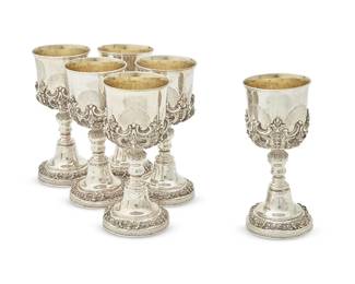 184
A set of eighteen Baroque-style silver-plated large goblets
20th century
Each unmarked
With gilt interiors and applied cast shell and scroll decoration
18 pieces
Each: 9" H x 4" Dia.
Estimate: $200 - $300