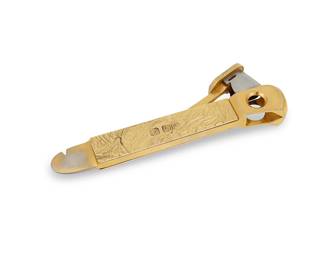23
An Elizabeth II 14K gold-mounted cigar cutter
1968
Mark of Alfred Dunhill & Sons, London, and date marked; further marked: 14 / 585
The metal cutter mounted with textured gold panels on each side
133 grams
XRF tested
5.5" L
Estimate: $1,200 - $1,800