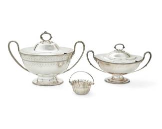409
Two English silver-plated tureens and a handled bowl
Late 19th/early 20th century
One tureen with mark of Walker & Hall and Sheffield and date marked for 1890; the other tureen and scalloped bowl each with mark of Atkin Brothers and Sheffield and numbered variously: 4693 / 5320
Comprising two footed covered tureens and a bowl with scalloped rim and bail handle
3 pieces
Larger: 12.5" H x 16.5" W x 8.5" D; Smaller: 9" H x 14.5" W x 8" D; Bowl: 5" H x 5" W x 4.75" D
Estimate: $200 - $300