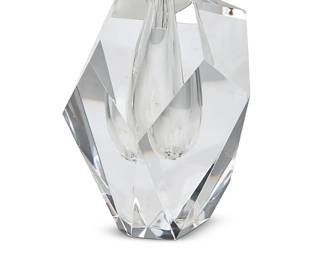 66
A Steuben glass bud vase
Late 20th/early 21st century
Designed by Paul Schulze, model introduced 1969
Etched: Steuben
The heavy faceted body with a teardrop-form reservoir, in factory box
Glass: 7" H x 5" W; Box: 6" H x 8" W x 10.375" D
Estimate: $200 - $300