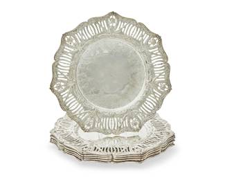 385
A set of forty-eight Godinger Silver Art Co. silver-plated chargers
Late 20th century
Each impressed: GODINGER
The shaped circular chargers with pierced rims with swag decoration
48 pieces
Each: 13" Dia.
Estimate: $300 - $500