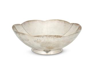 160
A Tiffany & Co. sterling silver footed bowl
Mid/late 20th century
Marked: Tiffany & Co. / Makers / Sterling Silver / 23843
With scalloped rim
3.125" H x 9" Dia.
20.5 oz. troy approximately
Estimate: $400 - $600