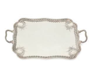 404
A Continental sterling silver tray
19th/20th century
Marked: 925 / OC
With repoussé rocaille decoration and opposed handles
1.5" H x 17.25" W x 11.25" D
30.3 oz. troy approximately
Estimate: $550 - $750