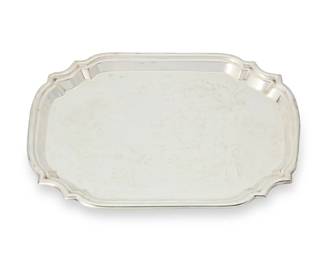 406
A Poole sterling silver tray
Mid-20th century; Taunton, Massachusetts
Marked for Poole and for sterling; numbered: 371
With tiered rim
0.5" H x 10.25" W x 14" D
23.4 oz. troy approximately
Estimate: $500 - $700
