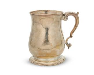 181
A George II sterling silver tankard
1743
Marked for London, sterling, and date marked; maker's mark for John Swift; with winged lion armorial
The footed tankard with scrolled handle and foliate-form accent, personalized
4.75" H x 5" W x 3.375" D
10.4 oz. troy approximately
Estimate: $500 - $700