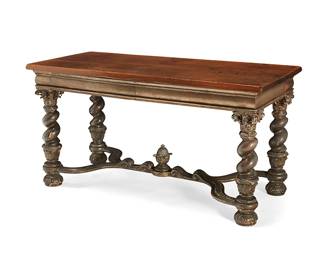 154
A Continental Baroque-style carved giltwood and gesso library table
19th century, with later elements
With two drawers, the interiors with later moiré lining, and Corinthian capitals above twisted legs joined by two opposing Y-form stretchers with a central carved pineapple finial
30.5" H x 58" W x 27.5" D
Estimate: $700 - $900