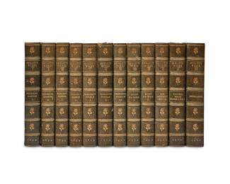 56
Tobias Smollett (1721-1771)
"The Works of Tobias Smollett," 1899
Hardcover books in 12 volumes
Smollett, Tobias. "The Works of Tobias Smollett." Westminster and New York: Archibald Constable and Co. and Chas. Scribner's Sons: 1899
Each 8vo bound by Zaehnsdorf in half blue morocco with gilt-stamped spine, marbled boards and endpapers, raised bands, and gilt upper page edges
12 pieces
Each: 9" H x 6.25" W; Overall: 15.5" D
Estimate: $300 - $500