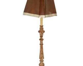 329
A Baroque-style carved giltwood floor lamp
20th century
The single-light lamp with candlestick-form standard raised on three legs with a tripartite base, surmounted by a paper shade, electrified
Overall: 60" H; Shade: 14" H x 16.75" W x 16.75" D
Estimate: $150 - $250