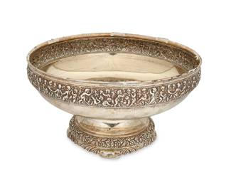 8
A Tiffany & Co. sterling silver 'Olympian' center bowl
Late 19th/early 20th century; Directorship of Charles L. Tiffany (1891-1902)
Marked: Tiffany & Co. / Makers / Sterling Silver / 925-1000 / T; numbered: 7816 / 2657
With a band of putti picking grapes around the rim, the round foot decorated with flowers and acanthus leaves
7" H x 12.125" Dia.
56.1 oz. troy approximately
Estimate: $2,500 - $3,500