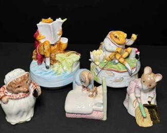Five charming Beatrix Potter figurines, each with unique details and origins