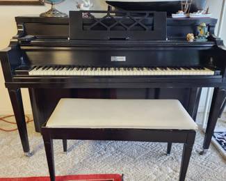 Black laquer upright piano 