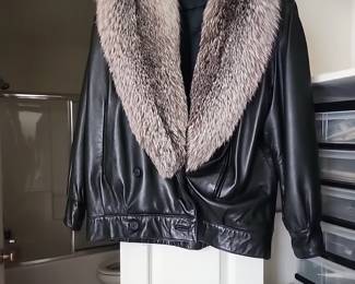 Leather coat with fur collar