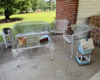 IRON SETTEE, 2 CHAIRS AND IRON AND GLASS TOP TABLE