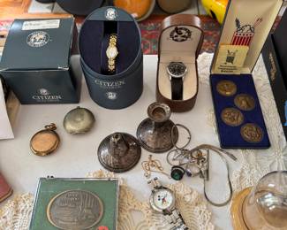 Coins, Jewlery, Silver, Pocket Watches (living room center table.)