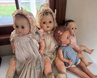 Antique Dolls (living room north wall table)