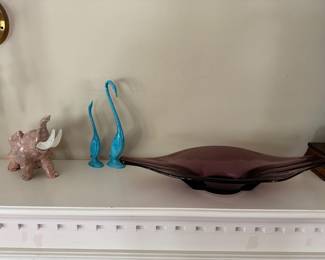 Stone elephant, mid-century swans, mid-century dish (fireplace mantle in living room)