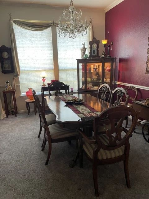 Dining Room - Table with 6 chairs and 1 leaf; Lighted display cabinet; side tables