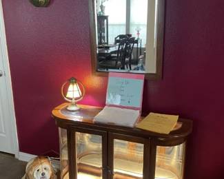 Entry lighted cabinet and mirror.