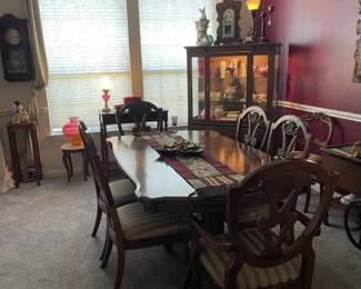 Dining Room - Table with 6 chairs and 1 leaf; Lighted display cabinet; side tables