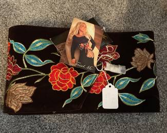 "Touch Me" wide embroidery on black felt belt.