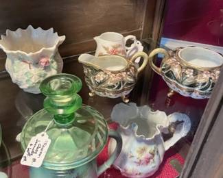 Misc small creamers, sugar. 2nd Vaseline glass candle holder.