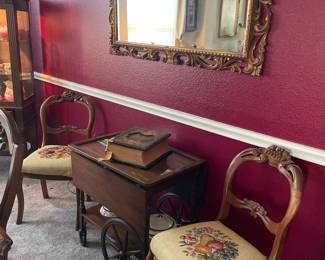 Serving Cart has removable glass top tray; 2 dining chairs, very old Holy Bible; Wall Mirror