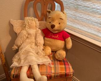 Winnie the Pool and Angel girl....just sitting around. Chair