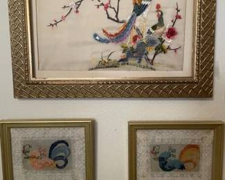 Beautiful intricately sewn embroidery on silk.