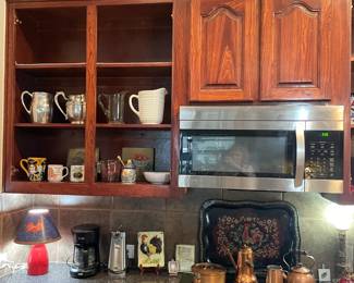 More kitchen decor....pitchers, cups, can opener, coffee pot, lamp, misc