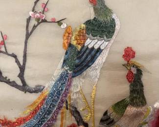 Beautifully sewn embroidery on silk - close up view