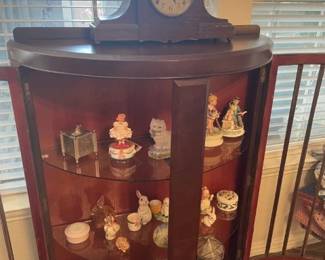 Mantle Clock; Contents first shelf - music boxes, 2nd shelf - rabbits and bunnies, 3rd shelf, vases and one Music Box.