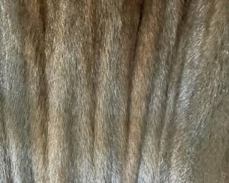 Close up view of full length mink. Light affected the color. Coat is dark.