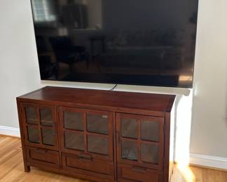 Several TV's , TV stand