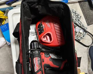 #36 - $100 - 2 - Milwaukee cordless screw drivers in bag with batteries and charger