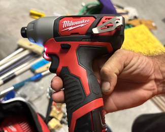 #36 - $100 - 2 - Milwaukee cordless screw drivers in bag with batteries and charger
