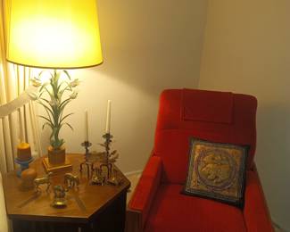 Octagonal table, vintage recliner, brass decor and metal lamp