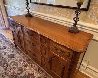 Thomasville antique walnut buffet 64" x 20" deep and 33" tall.