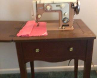 Universal Deluxe Model SAMB sewing machine $80.
