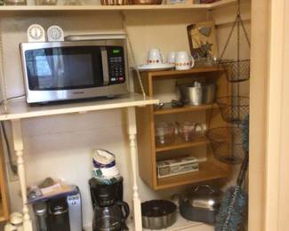 More kitchenware, microwave is sold