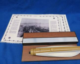Lot 318. Sears electric carving knife and four placemats with historic Minnesota landmarks
