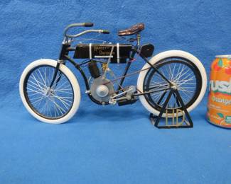 Lot 183. Xonex 1903 Harley-Davidson model. Seat needs to be reglued.