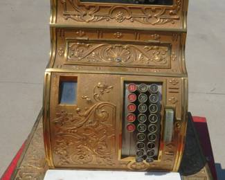 Lot 18. 1910 Brass National Cash Register Co cash register. Ser. No. 929605. Model 1030. Base 18" x 15.5". Height 26". One key. It likely needs cleaning to operate smoothly.