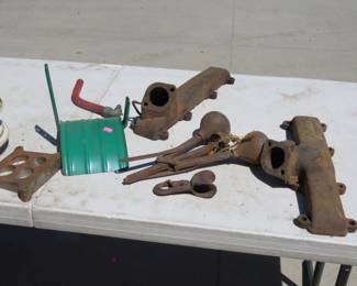 Lot 241. Cast iron, wheel, tote, and more